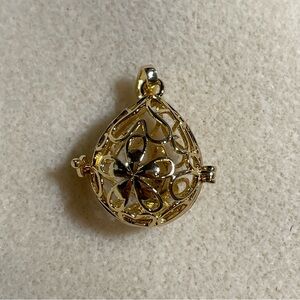 Elegant Filigree Gold Tone Teardrop Oil Diffuser Pendant